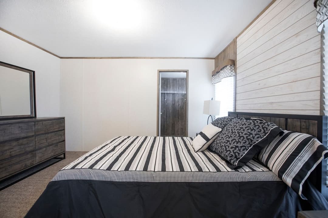 The southern farmhouse bedroom home features