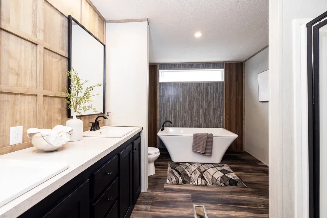 The dark sands bathroom home features